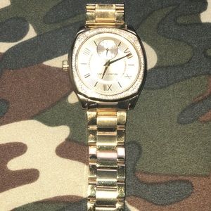 Women’s Micheal Kors gold watch